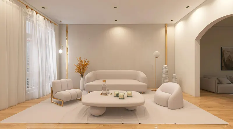 Kemerli geçişi, krem tonlu oturma grubu ve oval sehpasıyla aydınlık salon